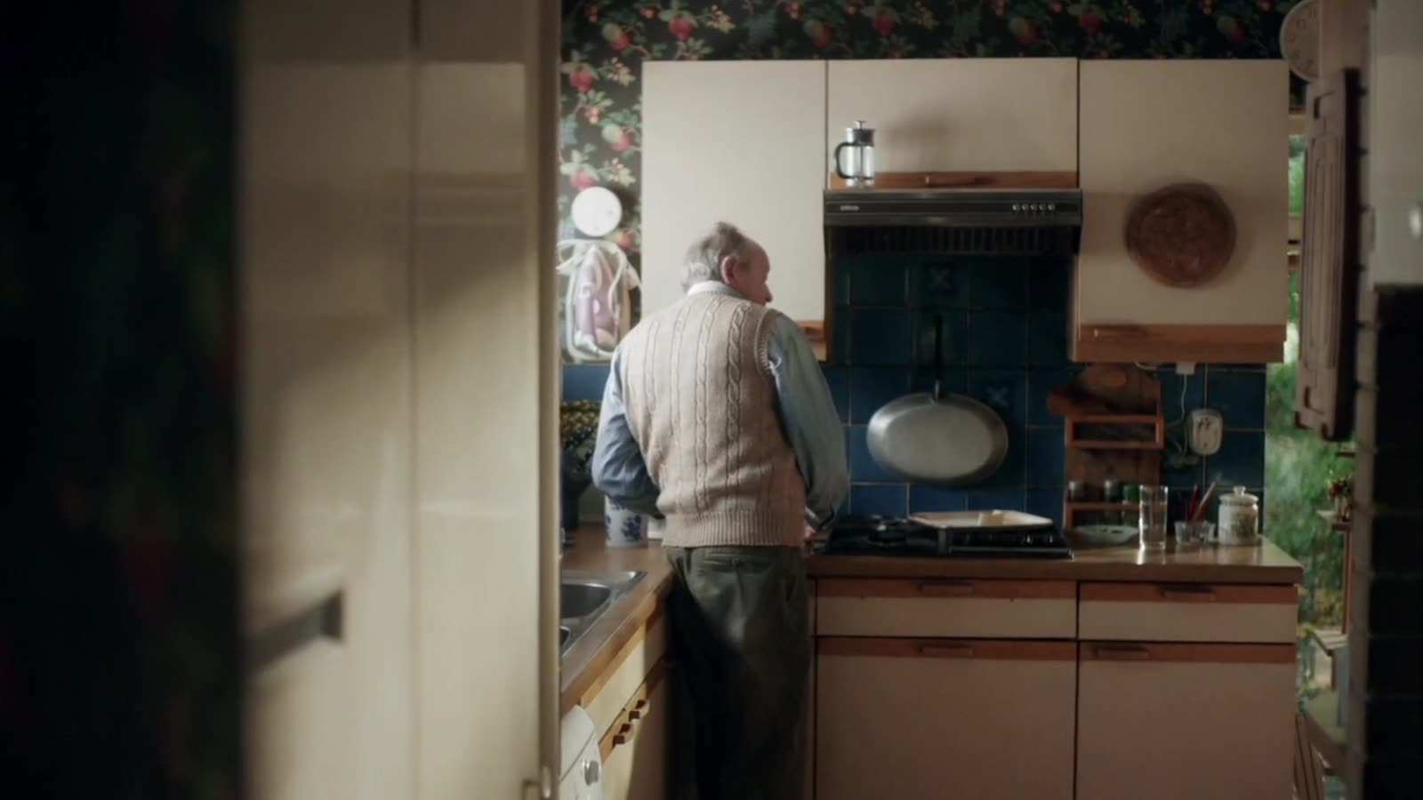 Film still, kitchen